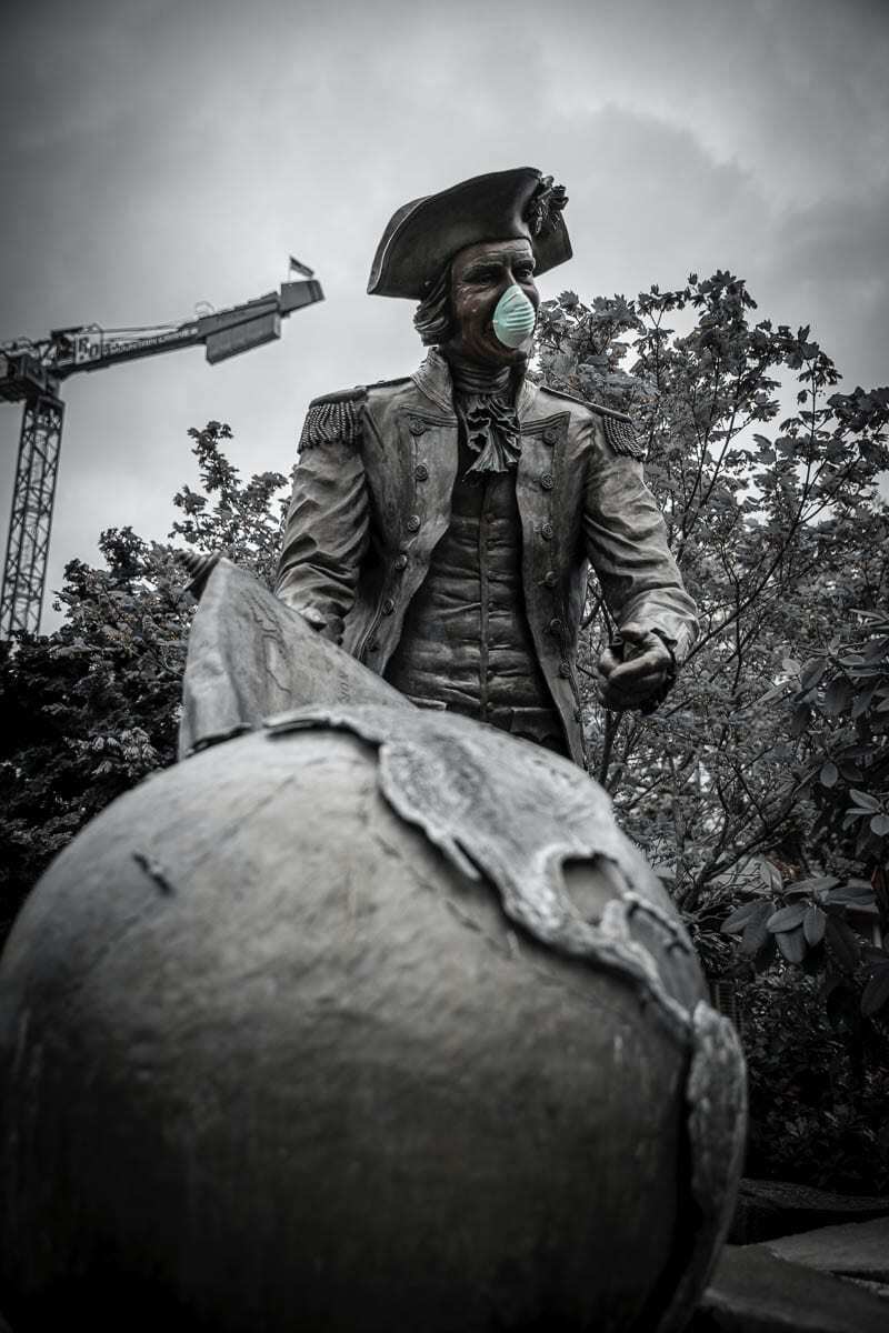 This masked up statue in downtown Vancouver was spotted shortly after a stay home order issued by Gov. Jay Inslee. Photo by Jacob Granneman