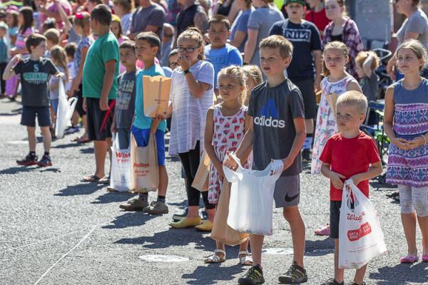 Children are shown here at the 2019 Harvest Days Parade in Battle Ground. On Wednesday, Gov. Jay Inslee increased the occupancy percentage for outdoor venues from 25 percent to 50 percent. File photo