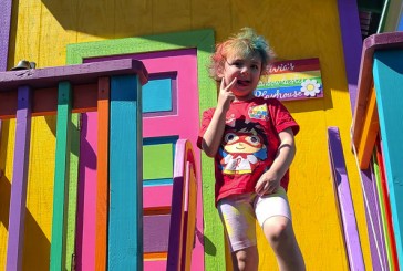 Olivia, with her rainbow hair and playhouse, hopes to pay it forward with Make-A-Wish