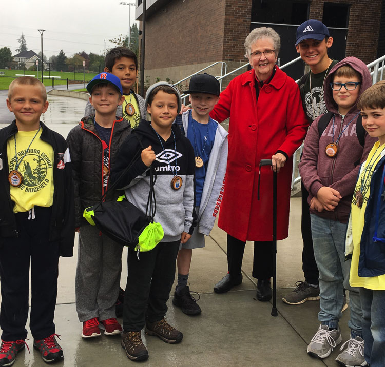 Allene Wodaege, who helped found Ridgefield’s Cispus Outdoor School with Union Ridge Elementary School principal John Hudson, joined a group of students as they left for camp in 2018. Photo courtesy of Ridgefield School District