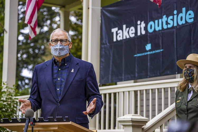 Gov. Jay Inslee is seen here in Vancouver on April 30, advertising his “Take it outside” campaign against the COVID-19 virus. Photo by Jacob Granneman