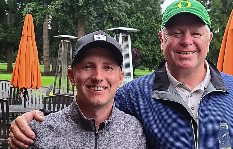 Zach Foushee, left, and his caddy Todd Gerot made for a championship team this weekend at the Royal Oaks Invitational Tournament. Foushee, a former Oregon Duck, set the tournament scoring record at 12-under-par for the three-round event. Photo by Paul Valencia