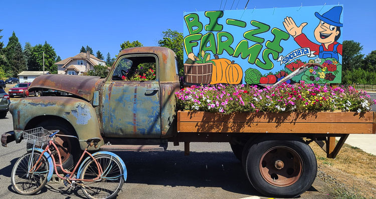 The BiZi Farms truck welcomes guests to the farm’s store at 9504 NE 119th Street. The Zimmerman family has been farming the land since the 1870s. Photo by Paul Valencia
