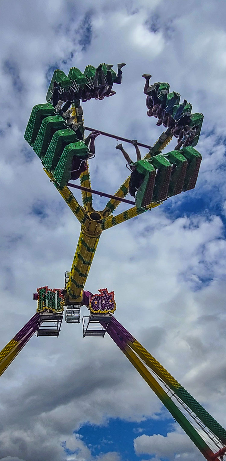 Foster Scott and Koen Peters, students from Hockinson High School, were among the first riders to dare to take on Freak Out at the Family Fun Carnival on Friday afternoon. Photo by Paul Valencia