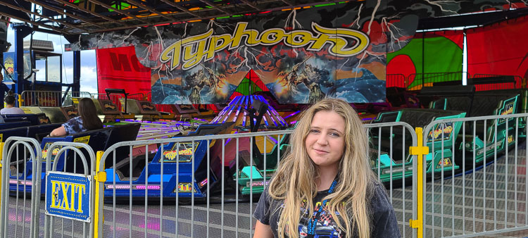 Julia “SmileyBear” Schultz was one of the first thrill seekers to arrive at the Clark County Fairgrounds on Friday, prior to the opening of the Family Fun Carnival. She said she missed not having the carnival last year, and she just had to be one of the first to be there when the carnival returned this year. Photo by Paul Valencia