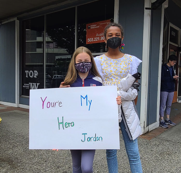CeCe Bruno (left) and Diarra Mboup were just two of the hundreds of fans who showed up to show their appreciation for Jordan Chiles. Photo by Paul Valencia