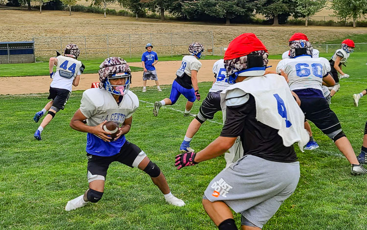 His ankle injury healed, Cepeda has “escapability” and is a threat to pass or run from the quarterback position at La Center. Photo by Paul Valencia