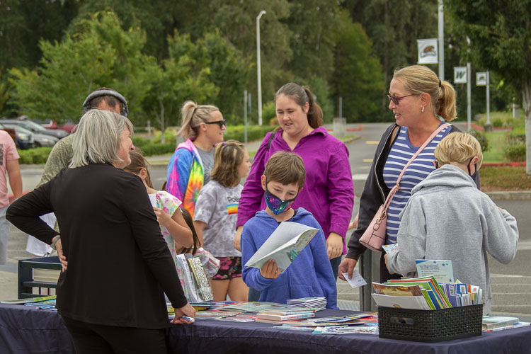 Representatives from local organizations were on-hand to provide information about free resources available to families. Photo courtesy of Woodland School District