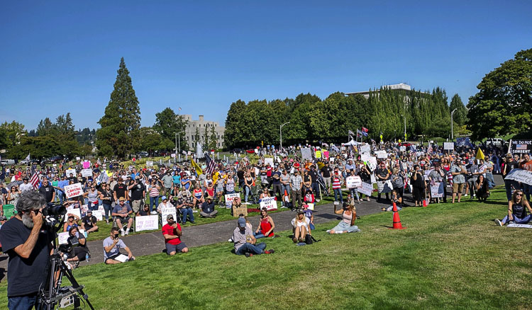 Between 1,200 and 1,500 people attended a protest rally at the state capitol in Olympia on Saturday. Glen Morgan estimated 75 percent of the attendees were government workers (or spouses). They may lose their jobs if they don’t comply with the vaccine mandate issued by Gov. Jay Inslee. Photo courtesy of Glen Morgan