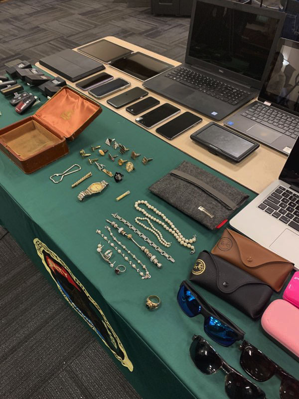 The Collier County Sheriff’s Office in Florida displayed dozens of stolen items recovered after the arrest of fugitive Anatoly Kutsar. The sheriff said there were hundreds and hundreds of pieces of property. Some could be from residents of Southwest Washington. Photo courtesy Rachel Heimann Mercader/Naples Daily News