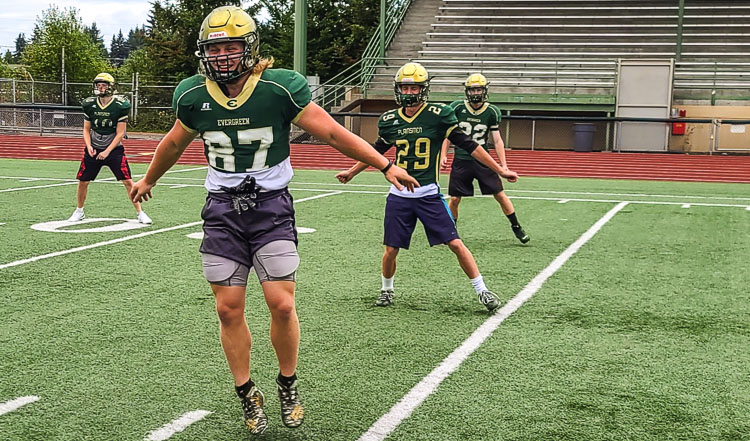 Gary McCulley was a “roly poly” when he was younger, but he went to work and now is ripped, playing linebacker for the Evergreen Plainsmen. Photo by Paul Valencia