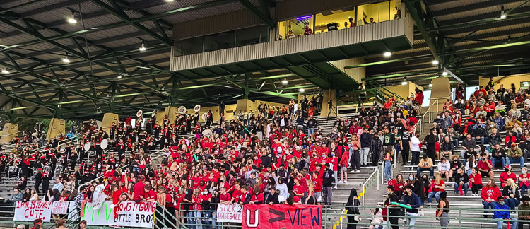Union was the home team for Friday’s night’s second game of the doubleheader, and students packed their section, all wearing red. Photo by Paul Valencia