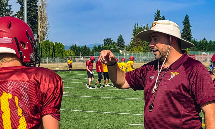 Prairie football coach Mike Peck said his team got better even after a loss last week, a game that started late after a long, crazy road trip to Eugene, Ore. Photo by Paul Valencia
