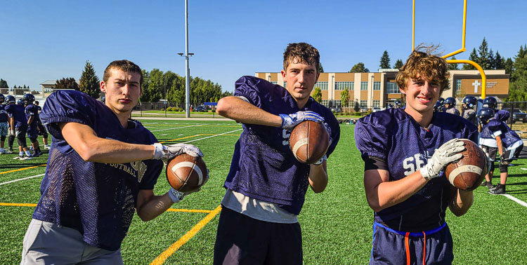 Sean Emberlin, Lance Stuck, and Dax Clifton are the senior leaders for a young but growing football program at Seton Catholic. Photo by Paul Valencia