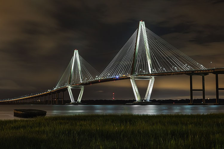 WSP USA designed this 13,200-foot-long, 8-lane bridge in Charleston for $632 million. It opened in 2007 and provides 186 feet of clearance for marine traffic. WSP USA is the consultant for the current Interstate Bridge Replacement Program effort. Graphic courtesy Wikipedia