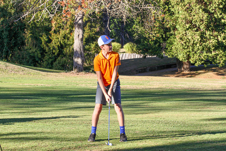View Ridge golf team member Brody Newcombe concentrates as he prepares his shot. Photo courtesy Ridgefield School District