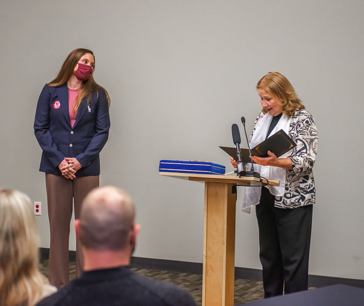 Mayor Anne McEnerny-Ogle reads the proclamation to Kara Winger. Photo courtesy city of Vancouver