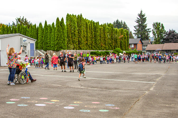 Students and staff at North Fork Elementary celebrate Head Custodian Ed Sorensen's retirement with a Celebration Tunnel. Photo courtesy Woodland School District