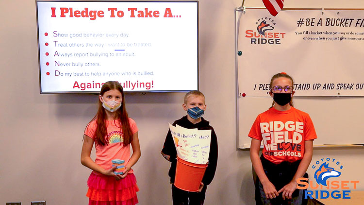 Sunset Ridge Intermediate School Leadership students shared information on the Pledge Posters and the Bucket Brigade. Photo courtesy Ridgefield School District