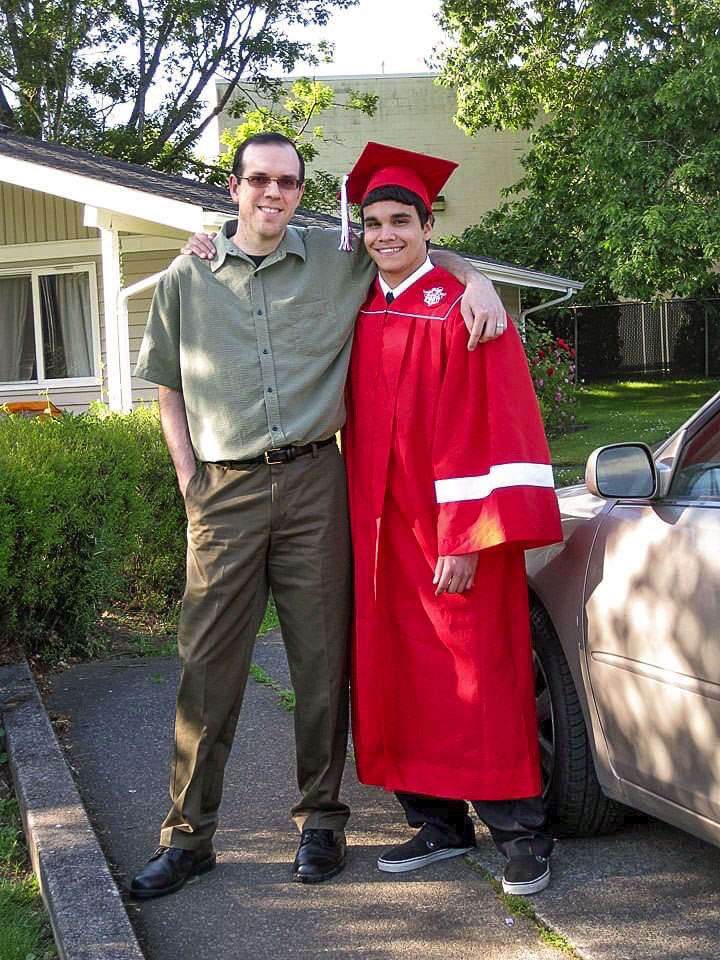 Shown here (from left) is Shawn Hamburg and Damien Wheeler celebrating Wheeler's graduation from Fort Vancouver High School in 2012. Photo courtesy Vancouver Housing Authority