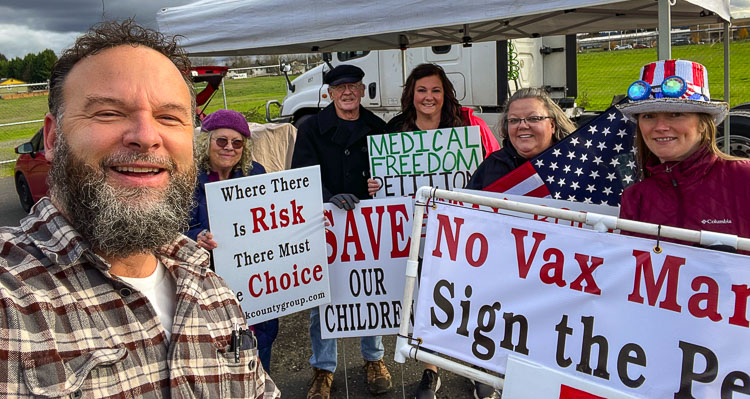 Proponents of a ban on mandates in Clark County that they believe cause discrimination based on someone’s health status, such as vaccination status, are making a final push to gather signatures on a petition by the end of November. Rob Anderson (front left) and other proponents are seen here at one of 25 signature-gathering stations in the area. Photo courtesy Rob Anderson