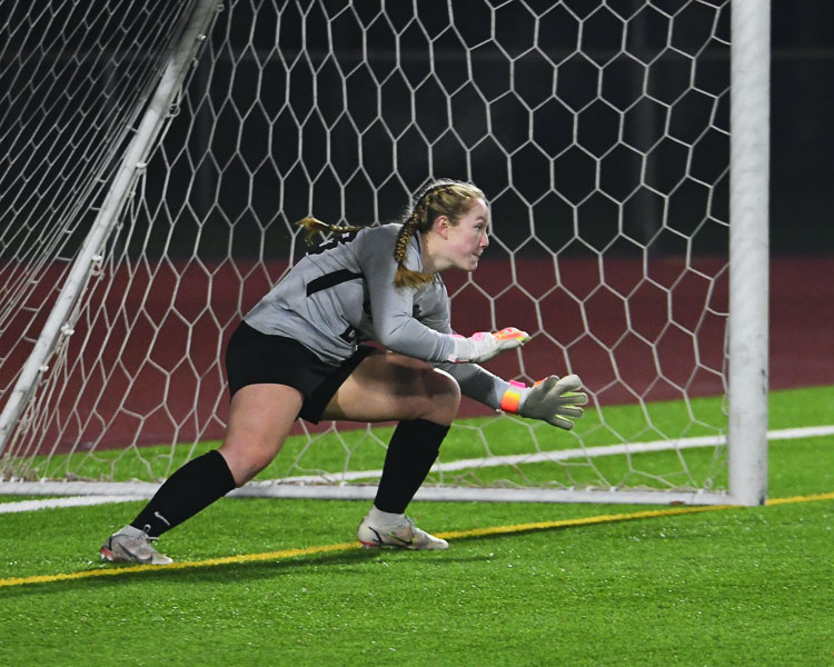 Keely Wieczorek with one of her two saves during the penalty kicks for the Class 4A girls soccer state championship. She said she read the opposition’s hips and knew exactly where to go to bake the saves. Photos courtesy Kris Cavin