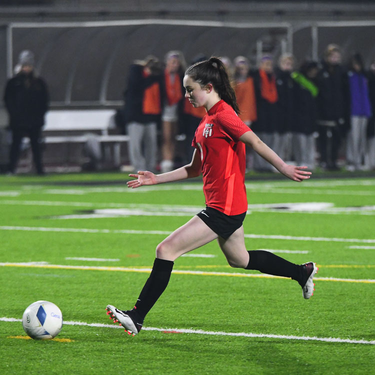 Nora Melcher unleashes the shot the secured the state championship for the Camas girls soccer team. Photo courtesy Kris Cavin