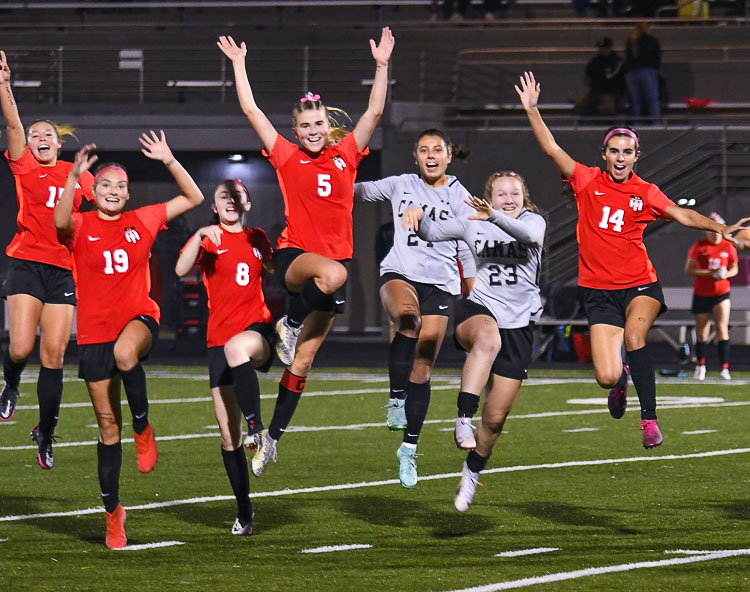 This photo was taken earlier in the season, but you can bet the Camas Papermakers are still all smiles, still jumping for joy after completing a perfect season Saturday. Camas beat Issaquah to win the Class 4A state girls soccer championship. Photo courtesy Kris Cavin