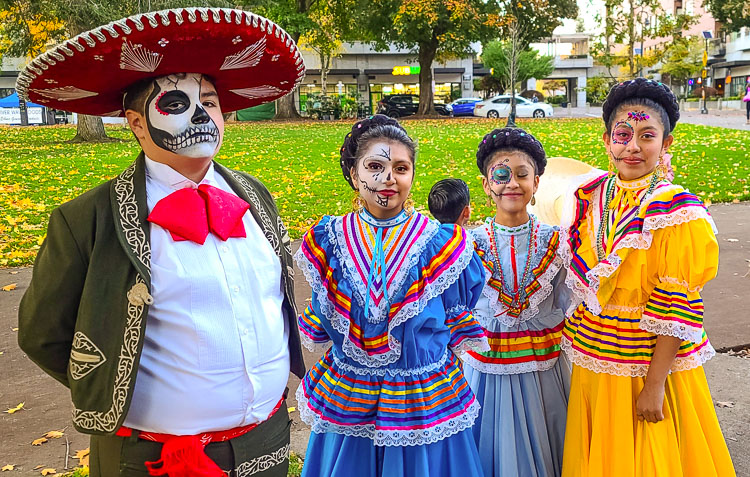 More faces and colors from Day of the Dead celebration. Photo by Paul Valencia