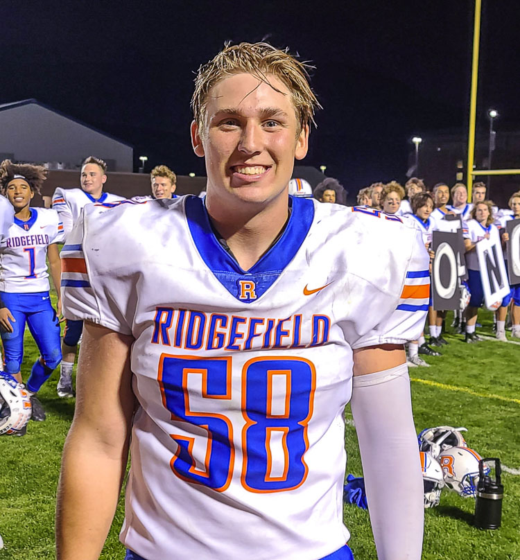 Wyatt Bartroff, a junior, has been Ridgefield’s starting center since his freshman season. He’s a tight end at heart, but his coach needs him to be the anchor on the offensive line. Photo by Paul Valencia