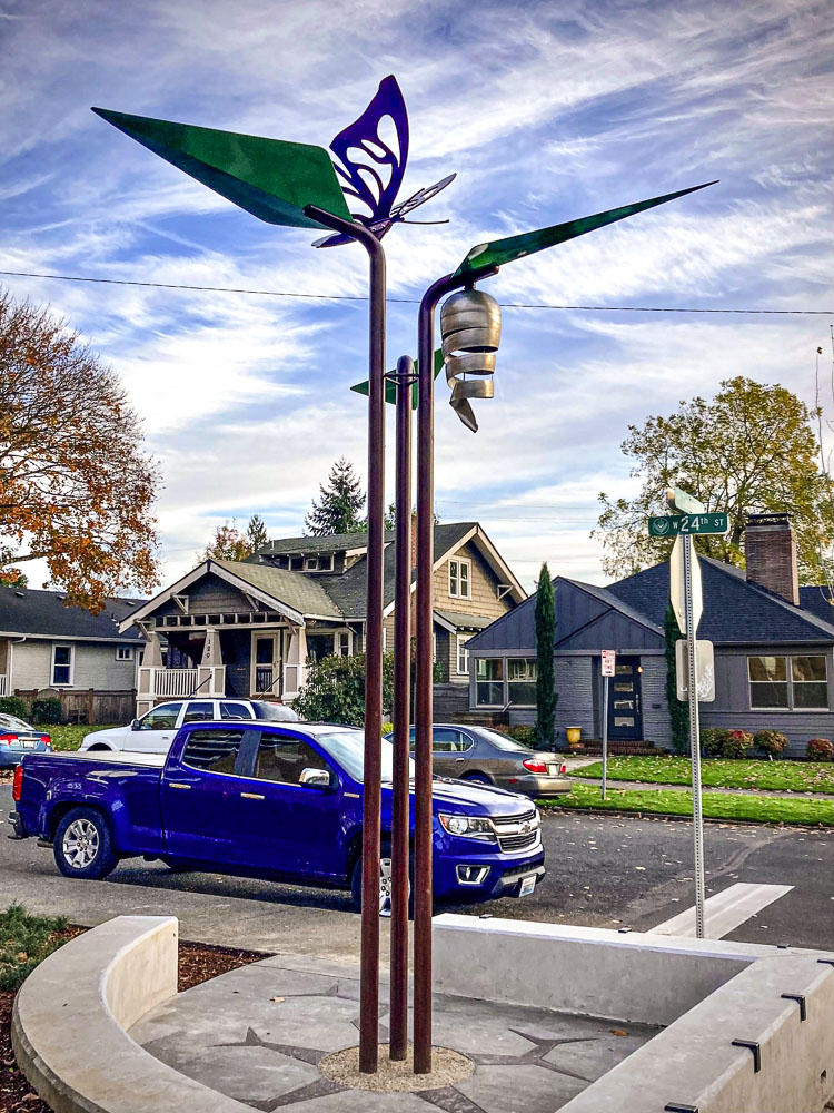 The sculpture at Columbia and 24th streets is made of stainless steel, weathered steel and powder-coated aluminum with LED lights that change colors. Photo courtesy Vancouver Housing Authority