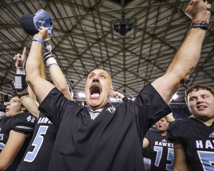 Rick Steele, pictured here celebrating the 2018 State Championship, has stepped down as Hockinson's football coach after the abridged spring season in 2021. Photo by Mike Schultz