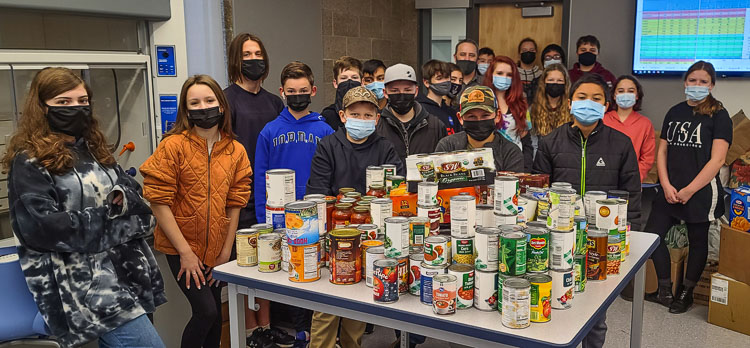 Students at Hockinson Middle School have been busy with the annual community food drive. The school has collected more than 7,000 items. Photo by Paul Valencia