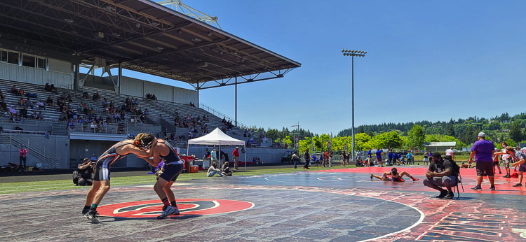 High school wrestling outdoors? At Doc Harris Stadium. Must have been 2021. Photo by Paul Valencia