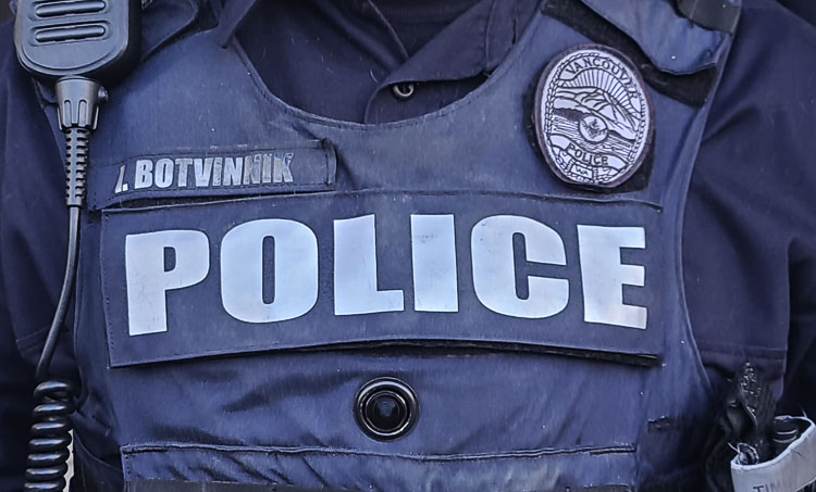 The camera lens for the body cams for this test is right in the middle of the work vest for Ilia Botvinnik of Vancouver Police. Photo by Paul Valencia