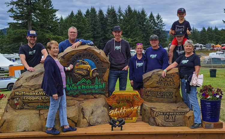 The family of Ralph Huffman gathered around Ralph’s Rock at the Washougal MX Park this summer. Ralph Huffman, the co-owner of the park who died in the spring, was instrumental in making Washougal an annual stop on the national motocross tour. Photo by Paul Valencia