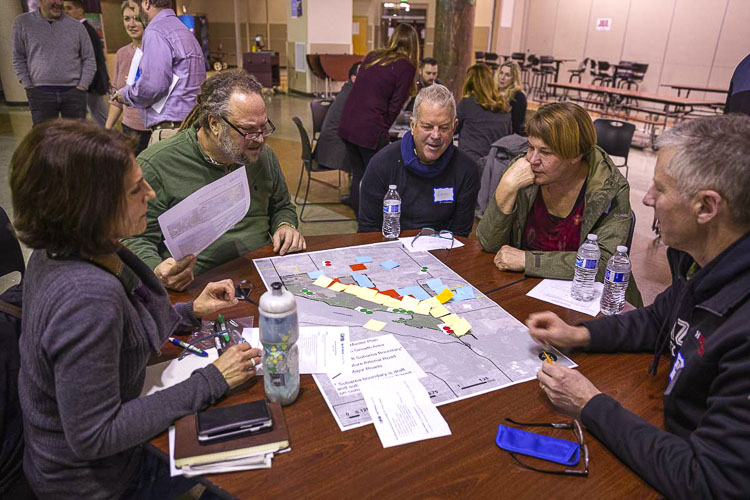 Camas residents Lynne Lyne, Scott Hogg, Randy Sedlak-Ford, Lyn Sedlak-Ford, and Dan Lyne work on an exercise of laying out classification for the development they’d like to see in North Shore. The event was held at Camas High School in February 2020. Photo by Jacob Granneman