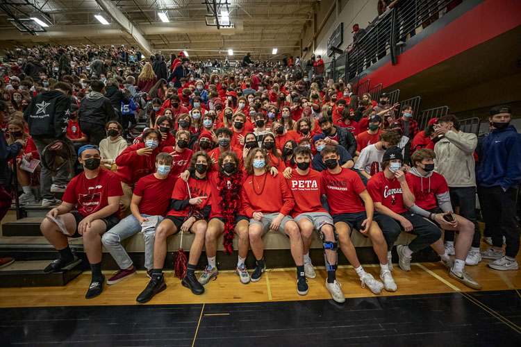 The calm before the storm. Probably the only time the Camas student section took a seat was before Tuesday’s big game against rival Union. Camas would go on to win and earn a share of the league title. Photo courtesy Heather Tianen