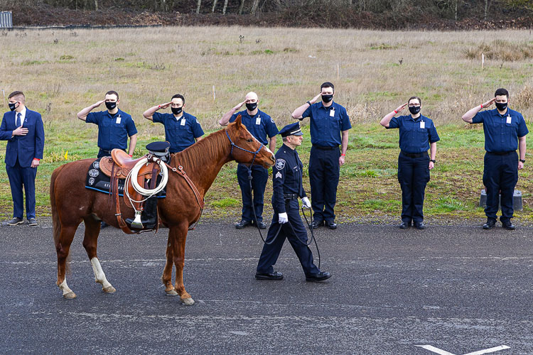 A riderless horse, symbolizing a fallen soldier, in this case Vancouver Police Officer Donald Sahota, is part of the procession at Tuesday’s Memorial Service. Photo by Mike Schultz