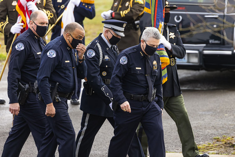 Vancouver Police Chief James McElvain (front) arrives at the Memorial Service for Officer Donald Sahota Tuesday. Photo by Mike Schultz