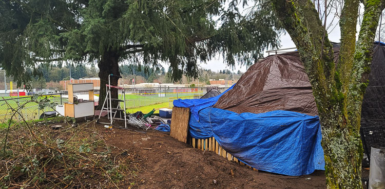 Here is a photo taken last week showing a homeless camp just on the city side of a fence around the campus of Fort Vancouver High School. Photo by Paul Valencia