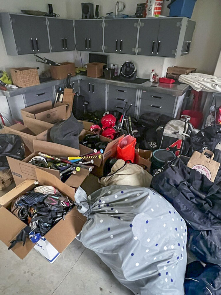 The family garage at the home of Naomi Green is getting full of baseball and softball equipment, which will be donated to children in Africa. Photo courtesy Naomi Green