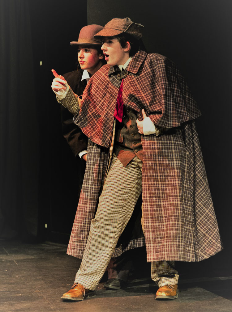 Lorelei Hunsaker as Sherlock Holmes and Tahlia Maya as Doctor Watson in Battle Ground High School Drama's rendition of "Baskerville." Photo courtesy Glen Erickson