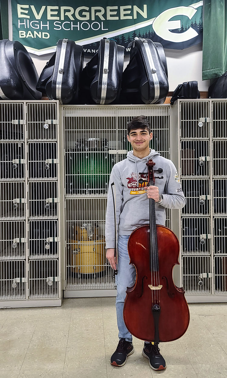 Lorenzo Anguiano, a senior from Evergreen High School, said he is at peace when he looks at his new cello, which was purchased after a GoFundMe account was made in honor of his dedication to music. Photo by Paul Valencia