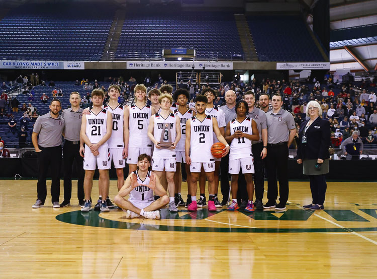 The Union Titans finished in fifth place in the Class 4A boys basketball state tournament. It is the eighth time the program has placed at state since 2009. Photo by Heather Tianen