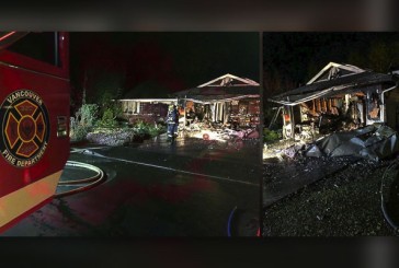 Vancouver firefighters battle house fire
