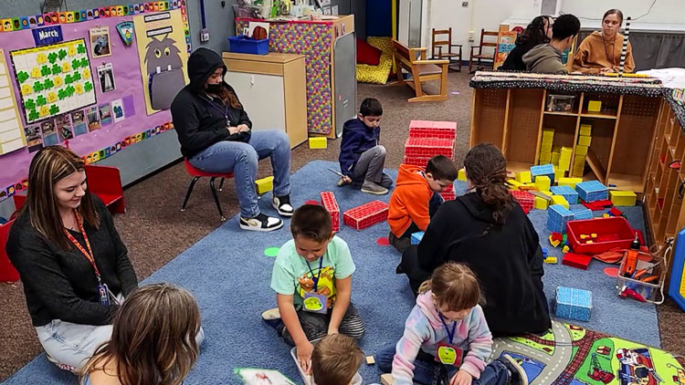 Prairie High School students studying Child Development get hands-on experience by helping at Prairie Preschool on the campus. Photo courtesy Battle Ground School District