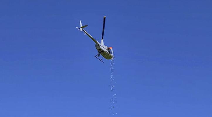 Golf balls are dropped to the 18th fairway at Tri-Mountain Golf Course on Saturday as part of the La Center Boosters 2022 Ball Drop Stadium Fundraiser. Photo by Paul Valencia
