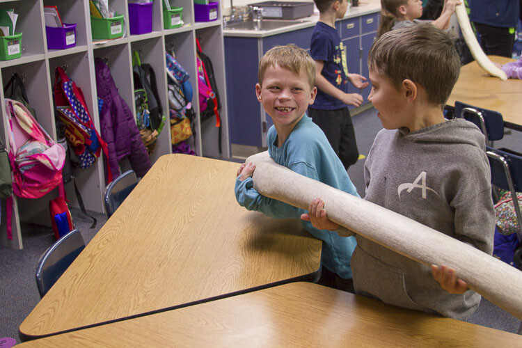 Students examined real whale bones including ribs and vertebrae. Photo courtesy Woodland School District
