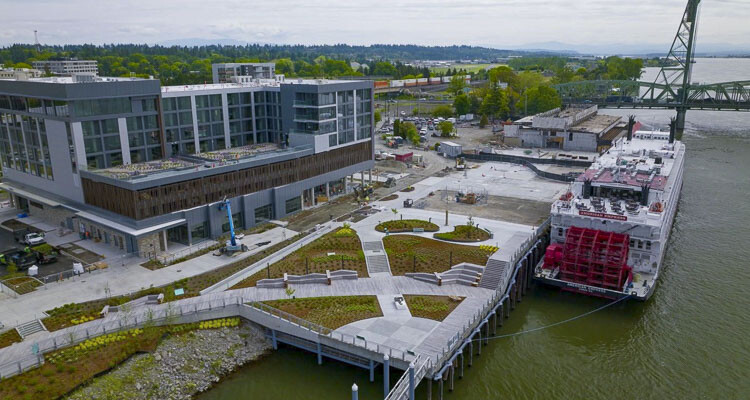 Finished Vancouver Landing with AC Hotel by Marriott to the north and the American Empress ship docked at Terminal 1 in May 2022. Photo courtesy Port of Vancouver USA